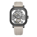 Luxury skeleton watch with carbon fiber case, tourbillon, and sporty rubber strap — motorsport-inspired design