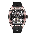 Motorsport-inspired luxury watch with rose gold-toned case, skeleton dial, black rubber strap