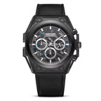 Machined black chronograph watch with blue accents, inspired by motorsport luxury design and bold wrist presence.