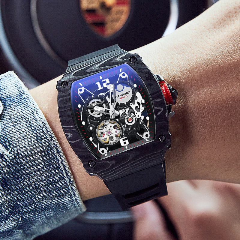 Hanboro sports luxury chronograph watch with skeleton dial and carbon fiber style case.