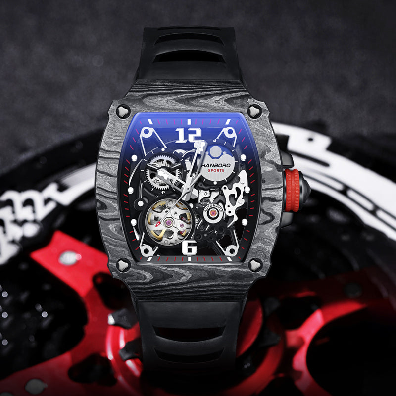 Hanboro sports skeleton chronograph watch with carbon fiber style case and black strap.