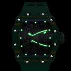 Luxury green racing chronograph watch with skeleton dial and luminous hands.