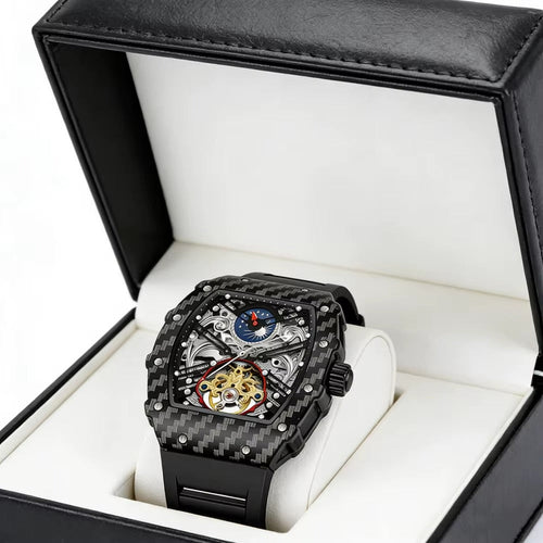 Luxury carbon fiber skeleton chronograph watch with intricate mechanical movement in a gift box.