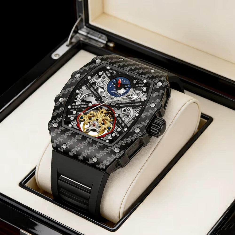 Luxury carbon fiber skeleton chronograph watch with moon phase complication in a display box.